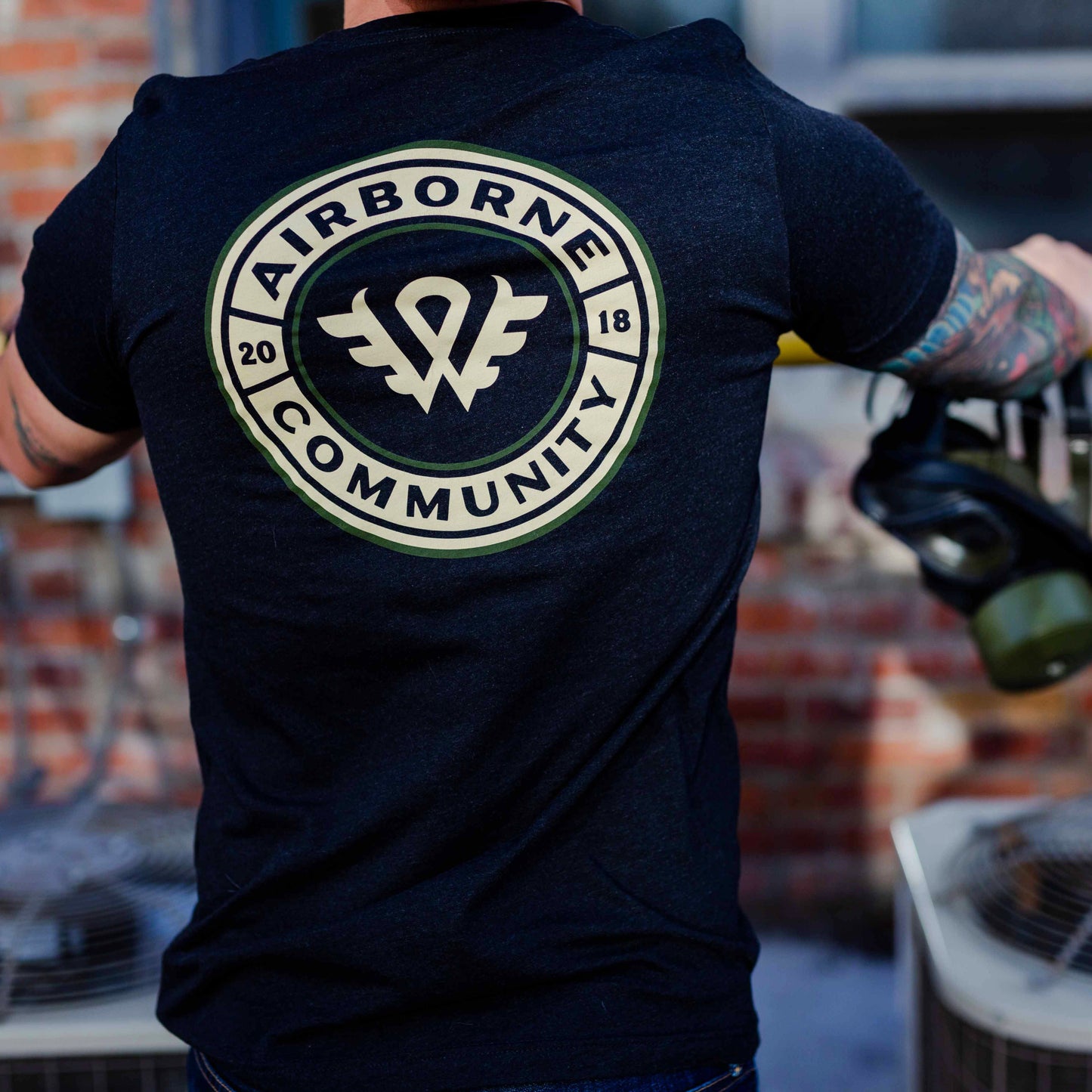 Community Badge Athletic Shirt