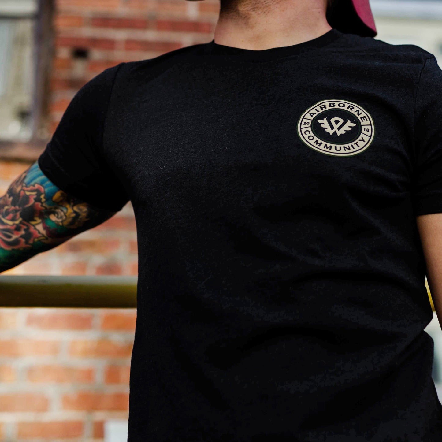 Community Badge Athletic Shirt